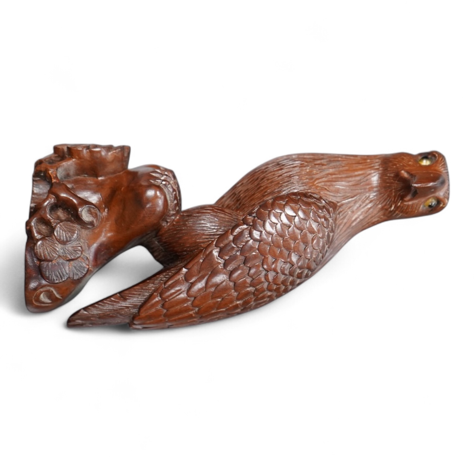 A Chinese rosewood carving of a hawk on base, with inlaid glass eyes, 13cm high